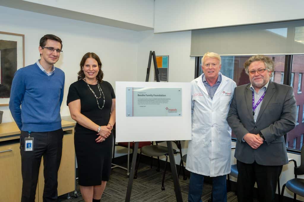 Image of L-R: Dr. Pol Darras, Mrs. Cindy Beedie, Dr. Gordon Francis, and Dr. Andy Ignaszewski