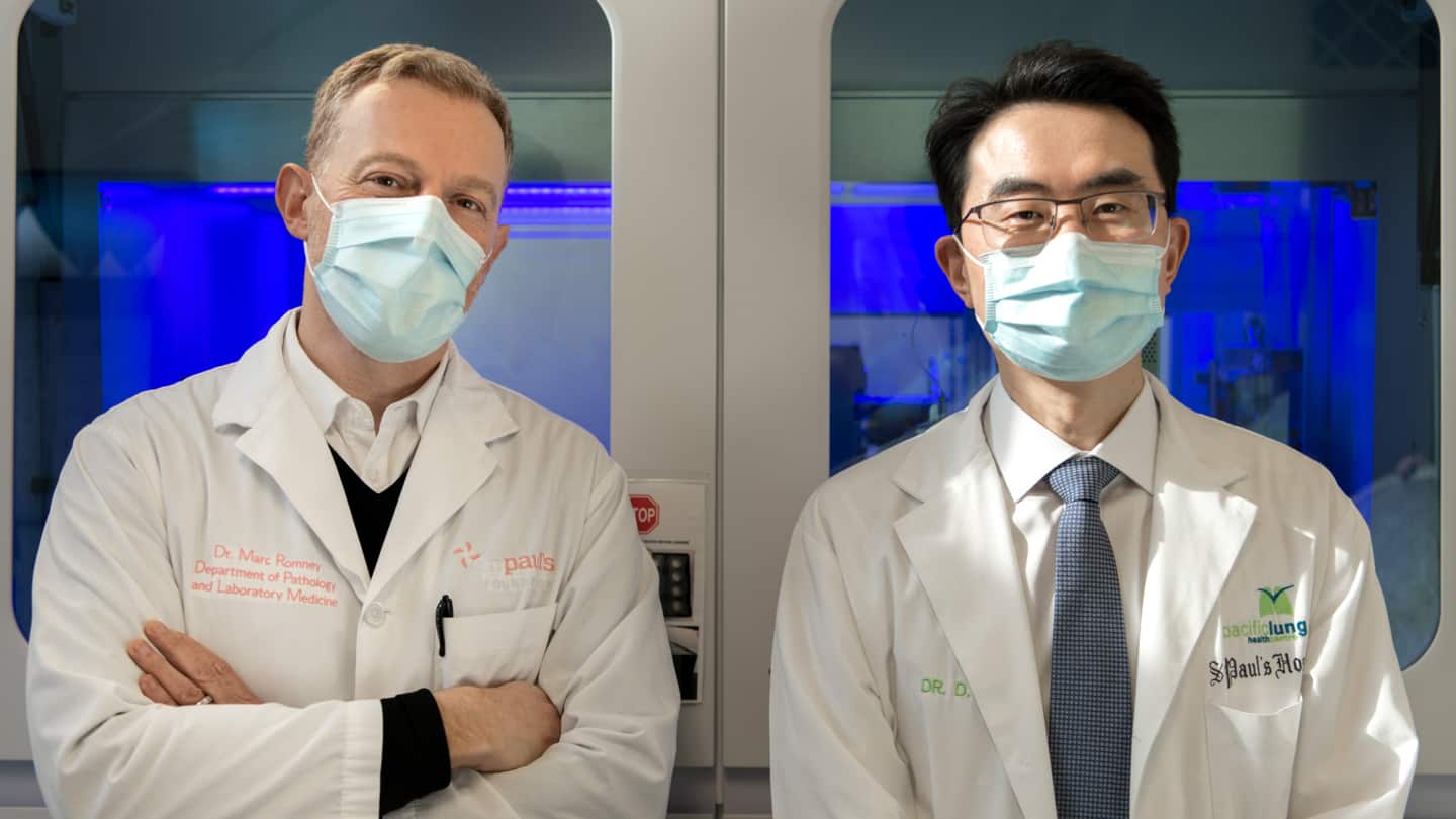 Image of two doctors in masks standing side by side