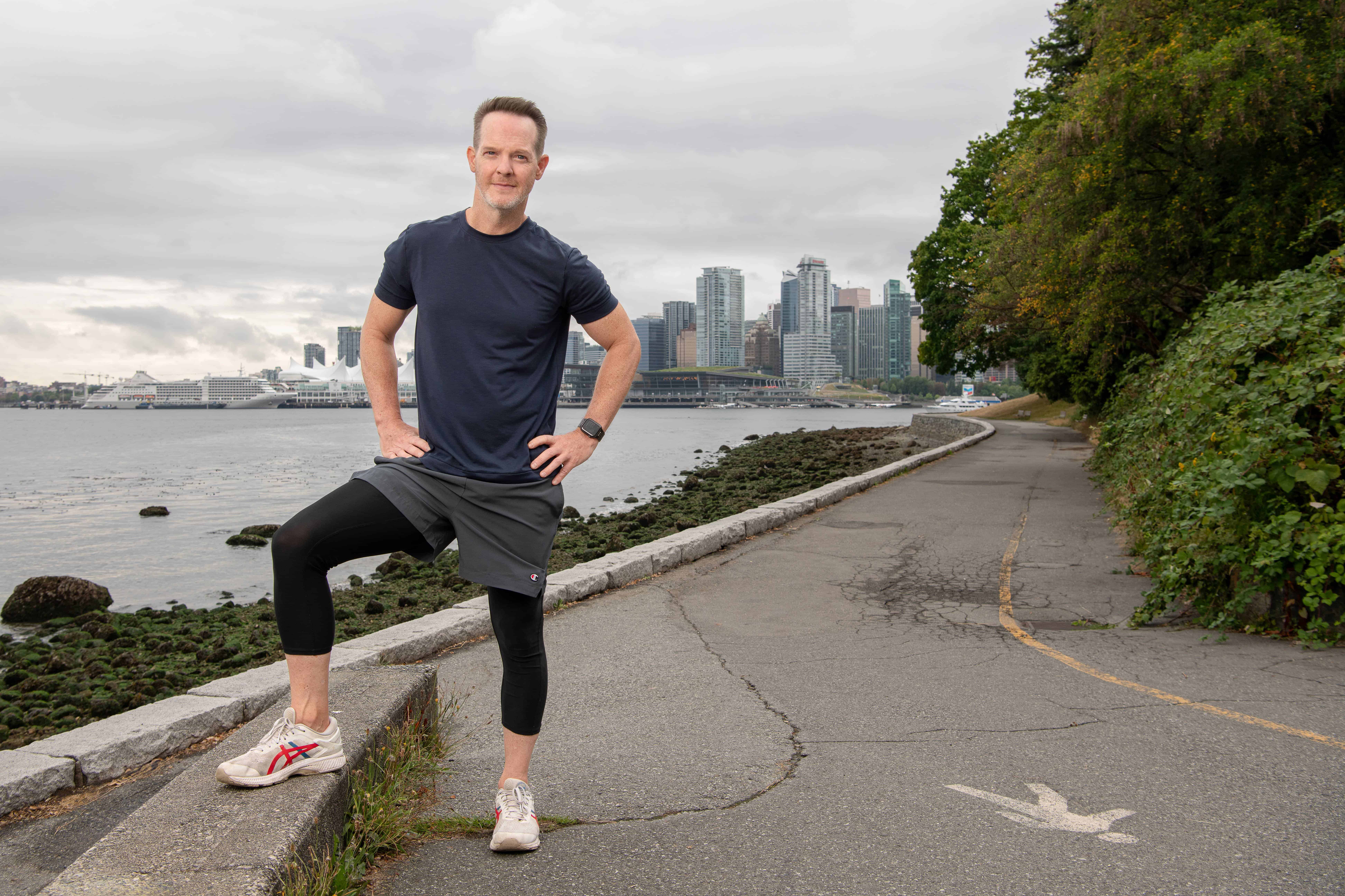 Jason Stanford stands along the Vancouver sea wall. Image for St. Paul's Foundation Annual Report