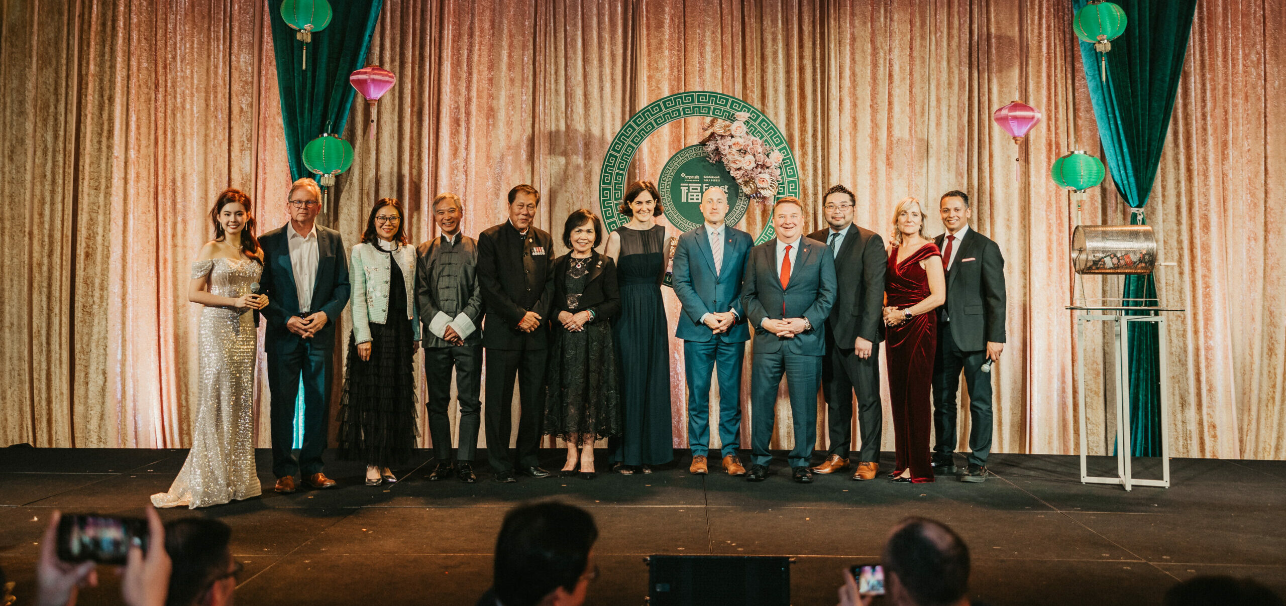 Group shot on stage at the 2025 Scotiabank Feast of Fortune gala. From L-R: Yi Yi Wang (MC); Douglas Kavanagh (Donor); Pao Yao Koo (Board Member, St. Paul’s Foundation & Director, PYK Consultants Ltd.); Dr. Anson Cheung (Director of Cardiac Transplantation for BC, St. Paul’s Hospital); Sing Lim Yeo (Honorary Chair & Co-Founder, Scotiabank Feast of Fortune); Patricia Yeo (Co-Founder, Scotiabank Feast of Fortune); Fiona Dalton (President & CEO, Providence Health Care); Andrew Wilkins (District Vice President, Scotiabank); Steve Gaskin (Sr. Vice President BC & Yukon at Scotiabank); Steve Kuo (Director, Sales Intelligence at Scotiabank); Sheila Biggers (President & CEO, St. Paul’s Foundation); Jason Pires (MC)