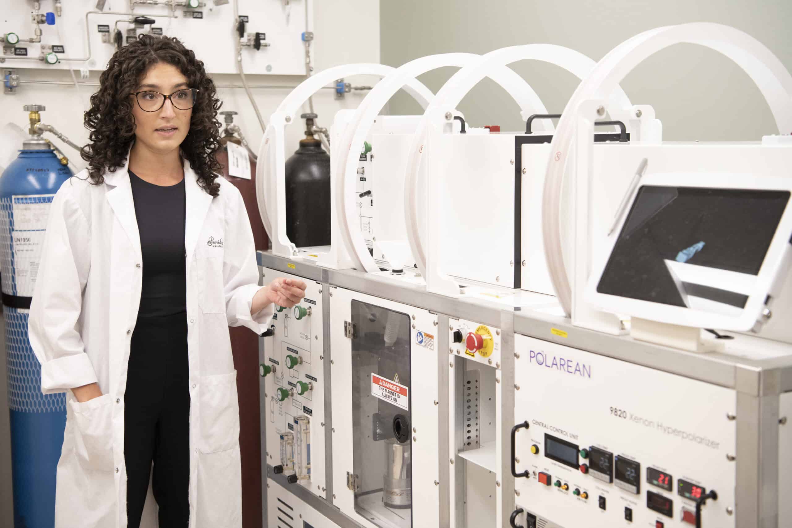 Photo of Dr. Eddy with the xenon gas hyperpolarizer.